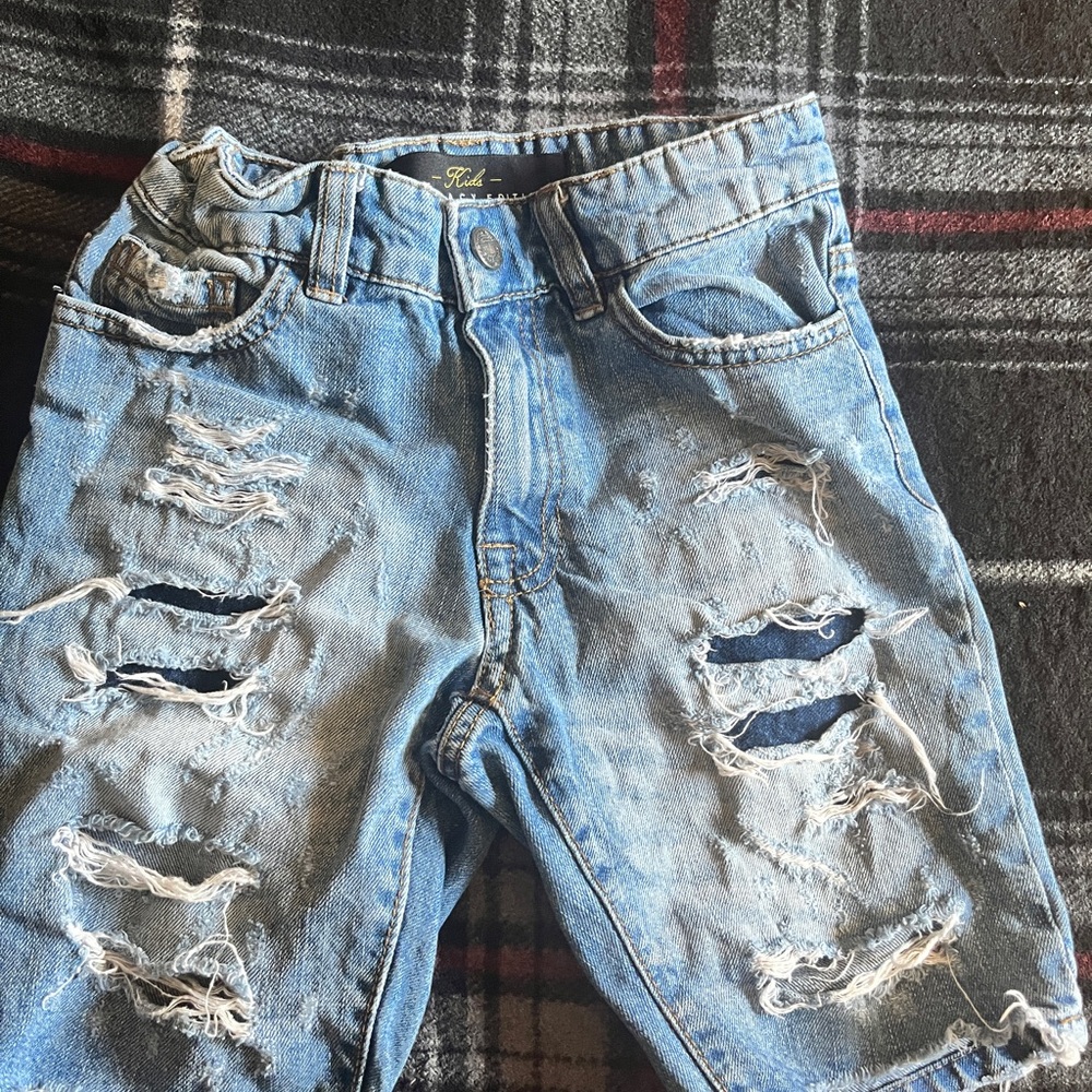 Boys size 6 Jean shorts with rips.